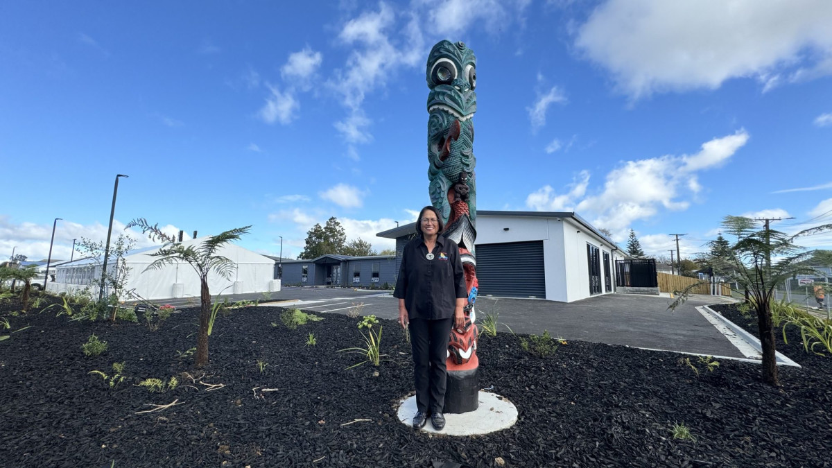 Lady Tureiti Moxon at the Pou, outside Te Kōhao Health Wellness and Diagnostic Centre